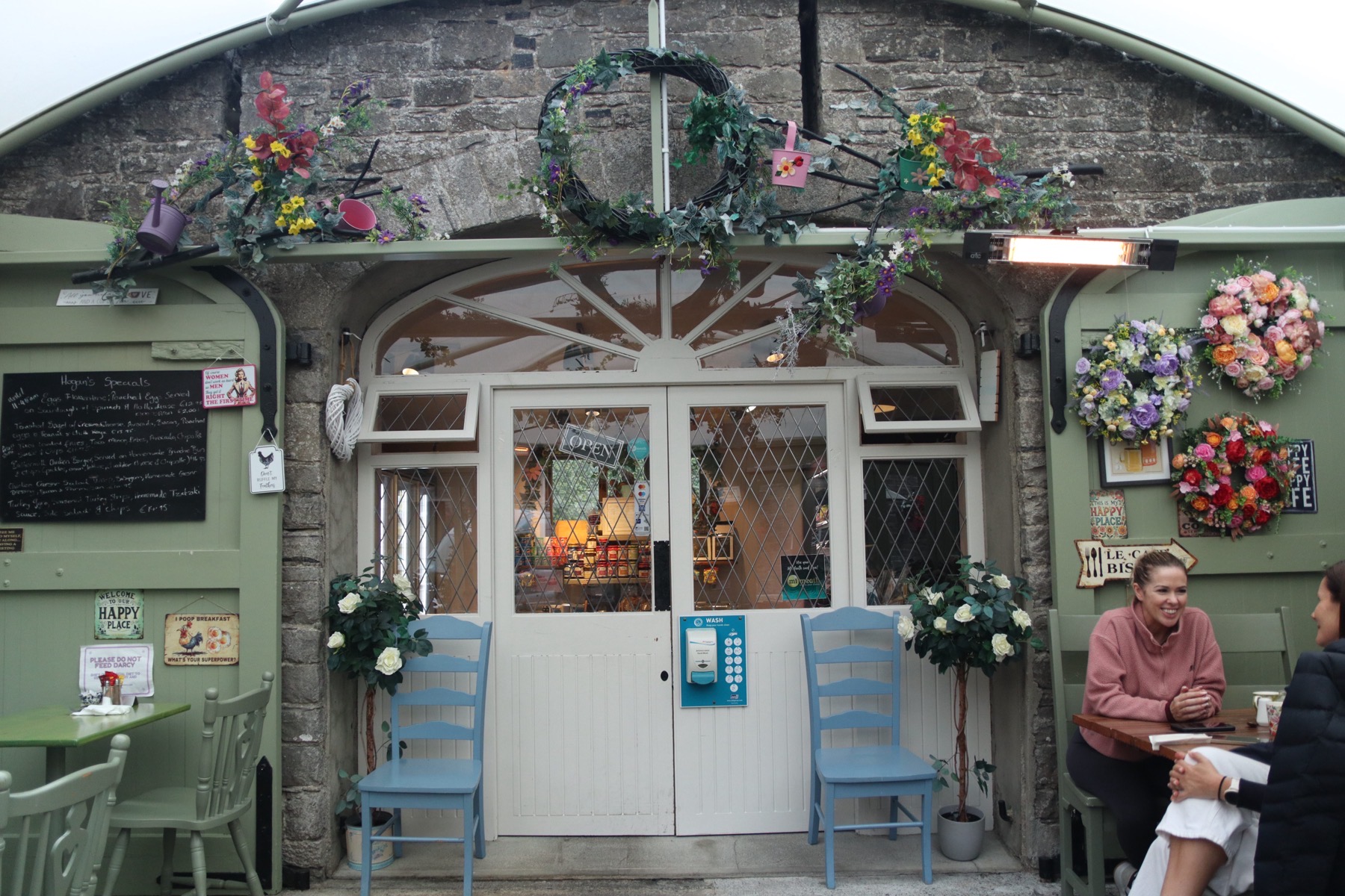 Flower-framed entrance to the Hogan’s Farm café