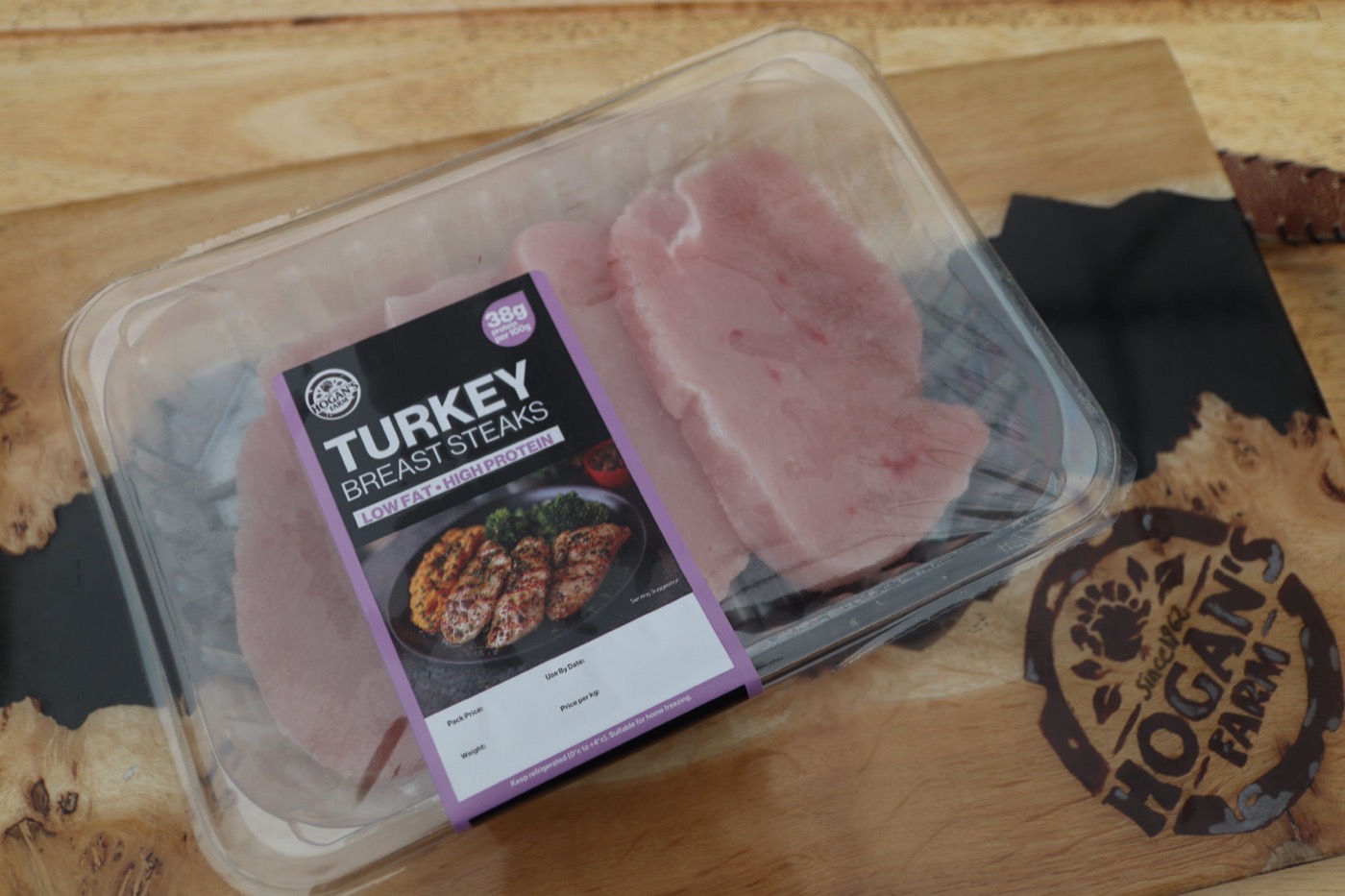 Turkey breast steaks on the branded board