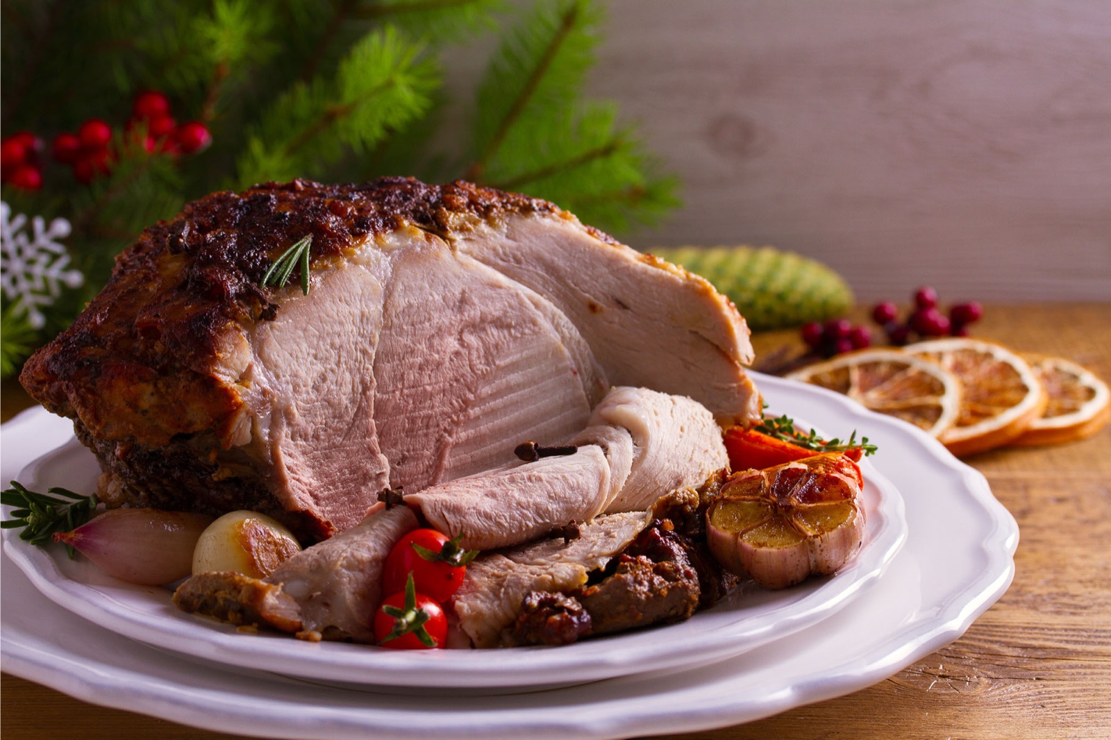 Honey glazed Christmas ham carved and served